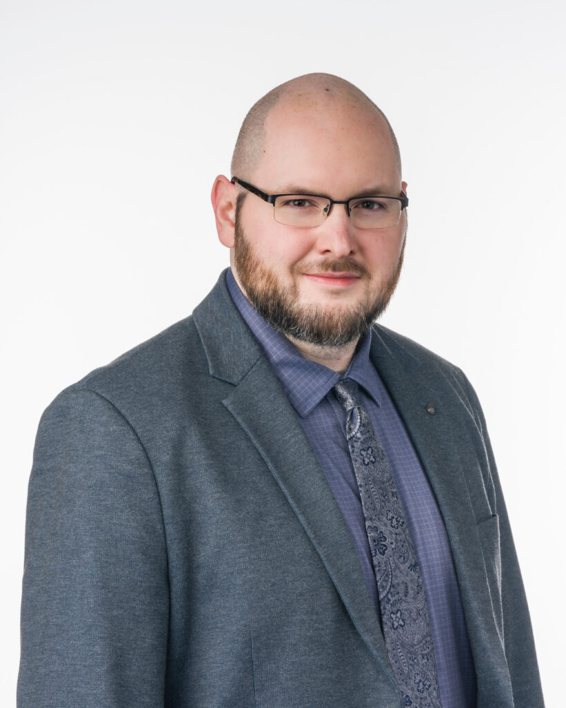 Headshot of Christopher Adamson